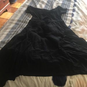 Free people black mid length dress with cut out.